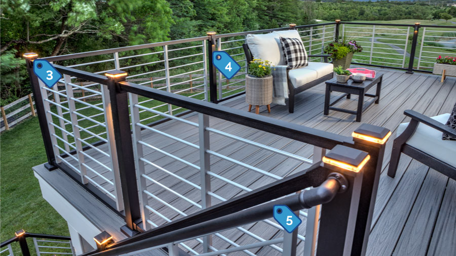 A country-style horizontal rod railing deck with lighting and railing products tagged