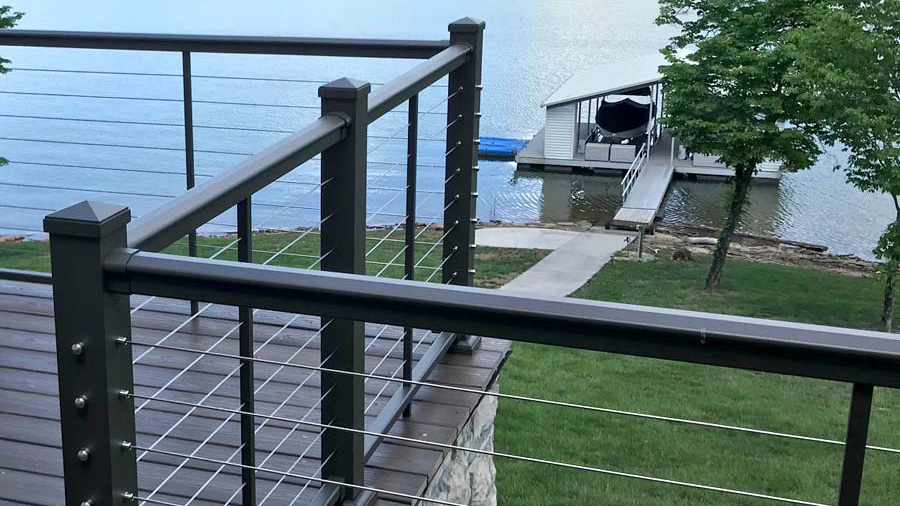 A lakeside deck overlooking the water through unobtrusive AFCO Cable Deck Railing