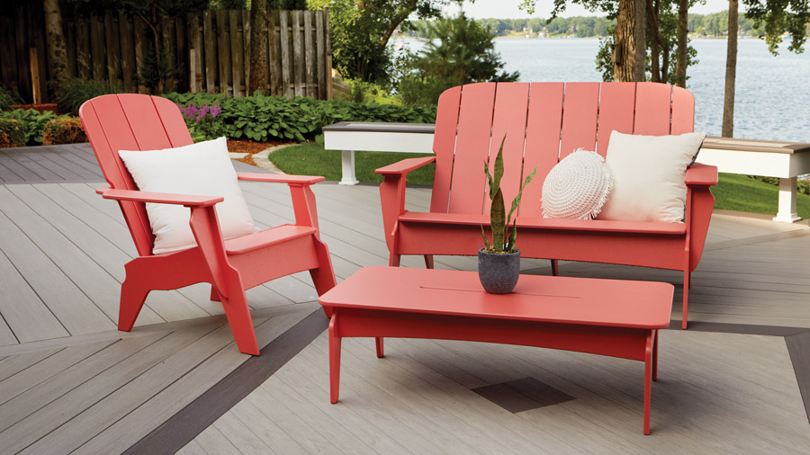 A set of TimberTech outdoor furniture including a chair, loveseat and table