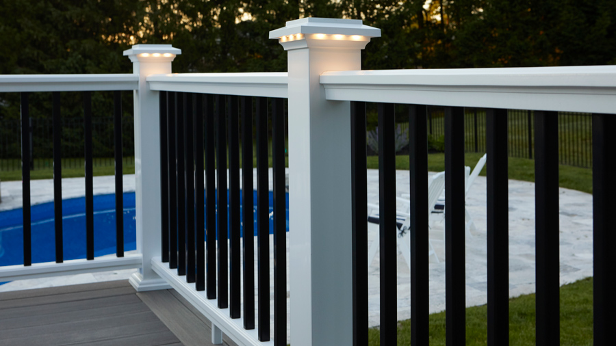 A stark white-and-black contrasting TimberTech Classic Composite deck railing