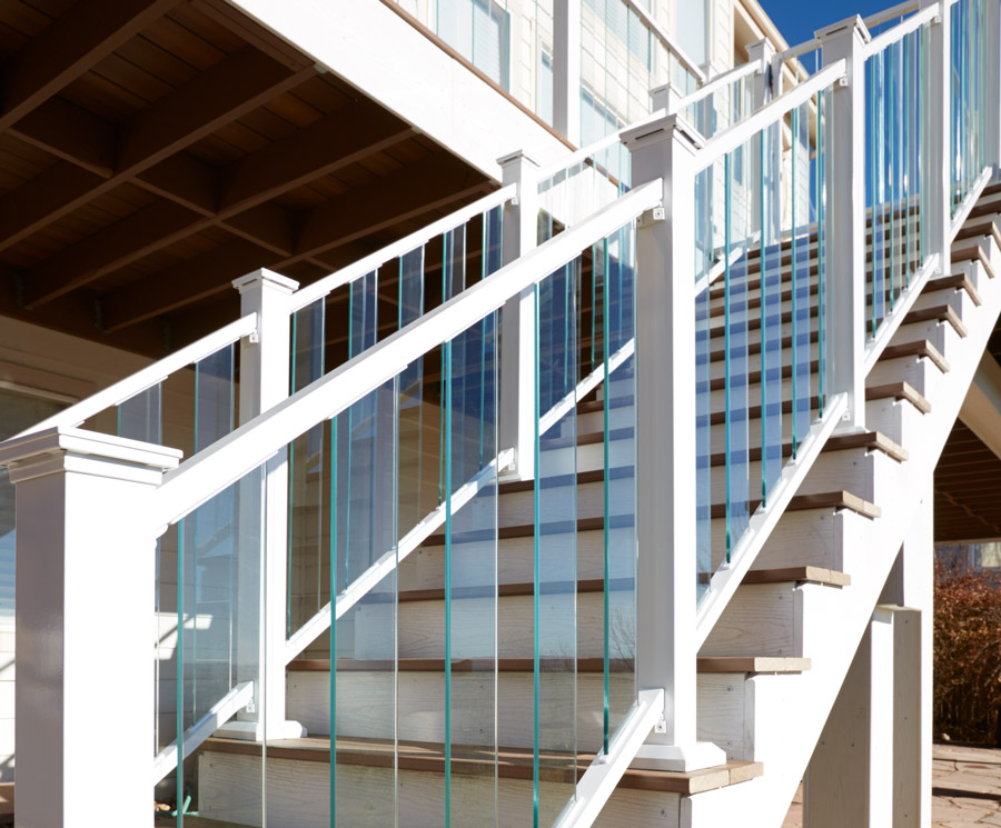 If you have glass deck railing, use glass balusters to easily extend your railing look down stairs