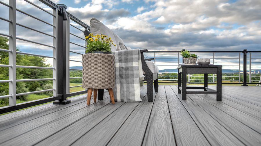 Trex composite deck boards with distinctive horizontal rod railing