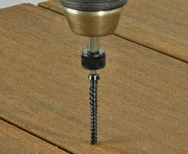Installing a screw with a specialized bit for a decking plug system