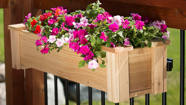 Deck railing with flow planter