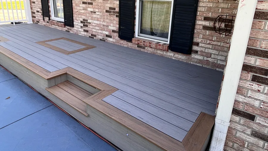 A clean, stylish deck surface made of TimberTech composite deck boards in Driftwood and Antique Leather colors