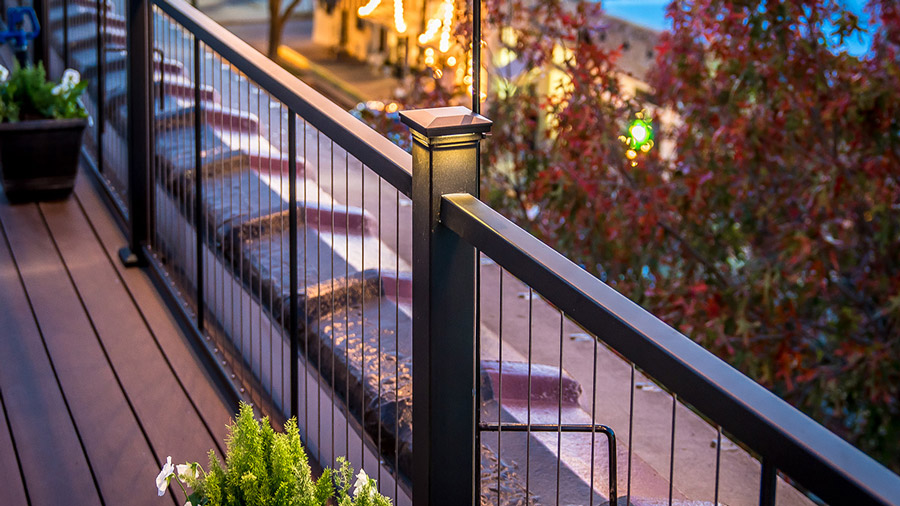 A deck with FortressCable V-Series vertical cable railing