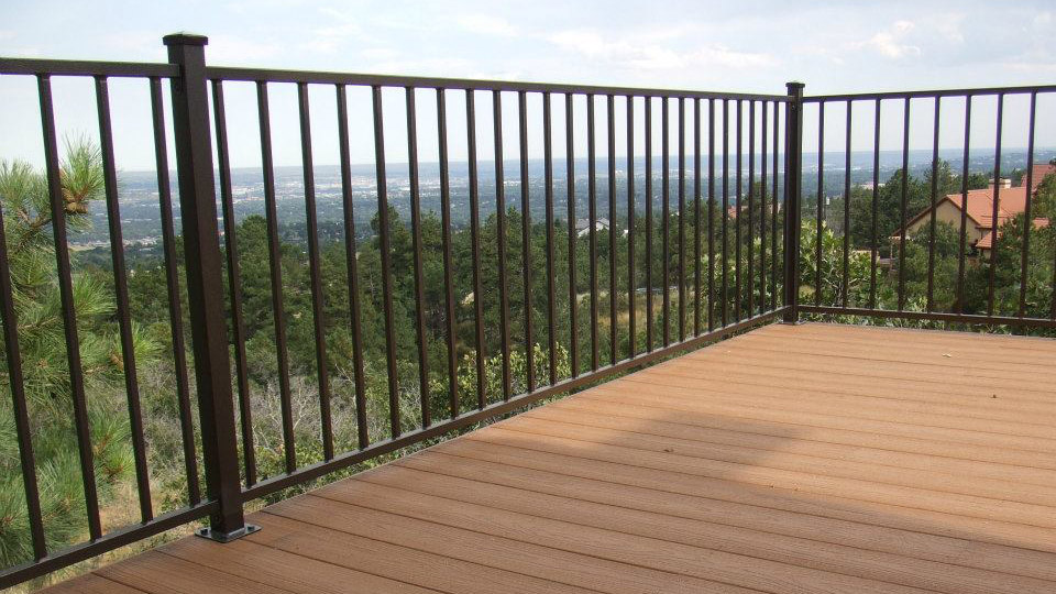 The thin rails and balusters of a Fortress FE26 steel deck railing