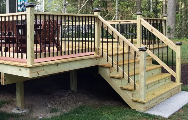 A wood deck refreshed with metal balusters and metal post caps