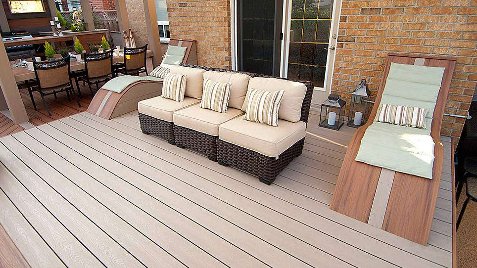 A soft brown deck with seating in the sun