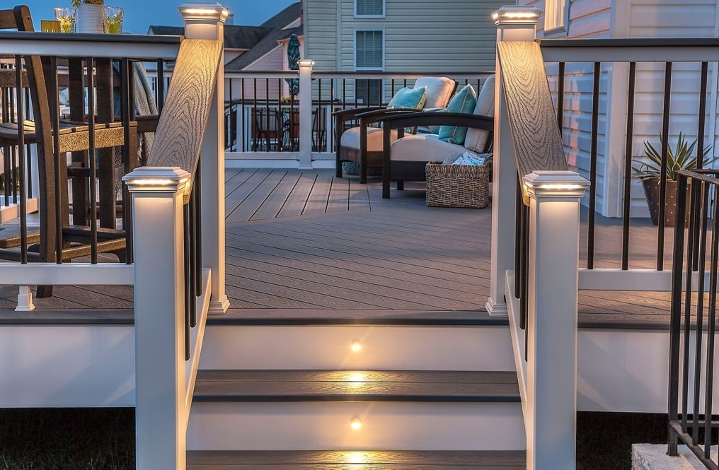 White riser boards create a brilliant contrast with darker-colored stair treads and deck boards