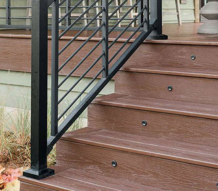 The ranch styling of Trex Signature Rod Railing on deck stairs