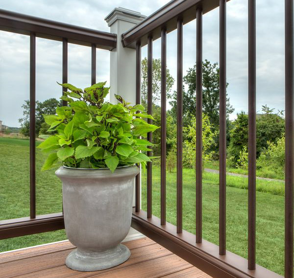 The view off a deck through composite railing using round balusters