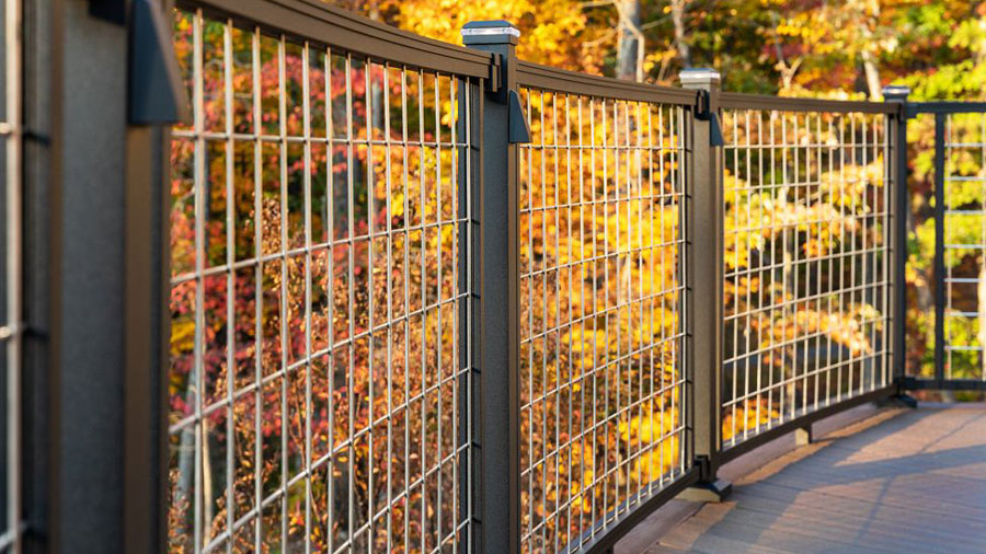 Trex Signature Mesh railing looks sharp in front of fall leaves