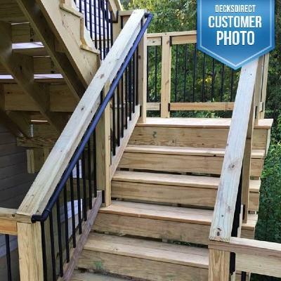 Adding a metal handrail to your staircase can add an extra detail of design to your outdoor living space