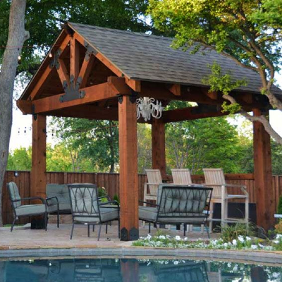Consider building a backyard pergola to expand your outdoor area for added outdoor seating
