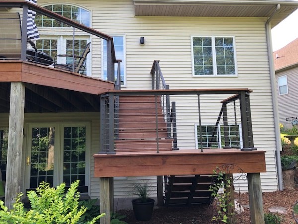 Janice installed Skyline Cable railing on her multi-level deck to create a beautiful backyard space with strong, bright views