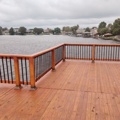 Learn how to install metal deck balusters on your wood deck railing to create a beautiful wood and metal deck railing for your home's backyard