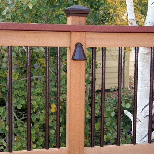 Traditional round metal balusters from Dekor can be installed along deck railing sections for a clean beautiful look