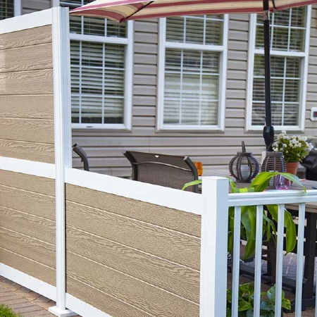 Build a backyard privacy wall to block out nosy neighbors and be able to enjoy your backyard space