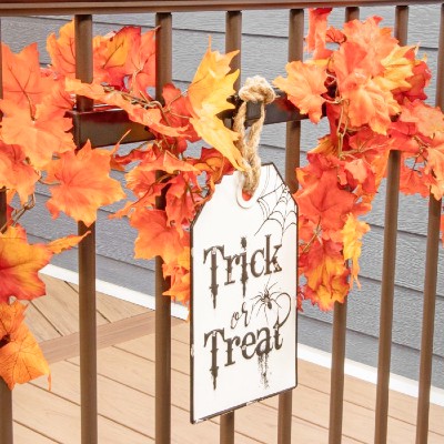 Hang a cute little Halloween sign on your patio or deck railing to let the little goblins know that Halloween candy is here!