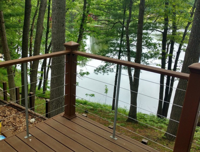 Find out how to install cable deck railing along corners to create a beautiful DIY deck railing design