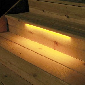Installing under tread strip lights can brighten up your entire outdoor living space