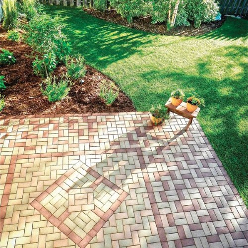 A patio is an outdoor living space that is level with the ground