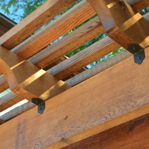 Learning how to build outdoor seating with structural hardware can help expand your outdoor living space