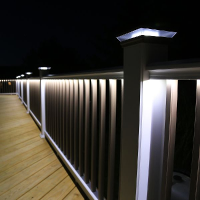 Consider deck rail lighting along your deck railing layout to add an extra touch of illumination for your family's outdoor space