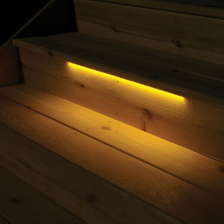 Add rail lighting, like te Odyssey LED Strip Light from Aurora Deck Lighting to your outdoor living room and increase the feel of your space