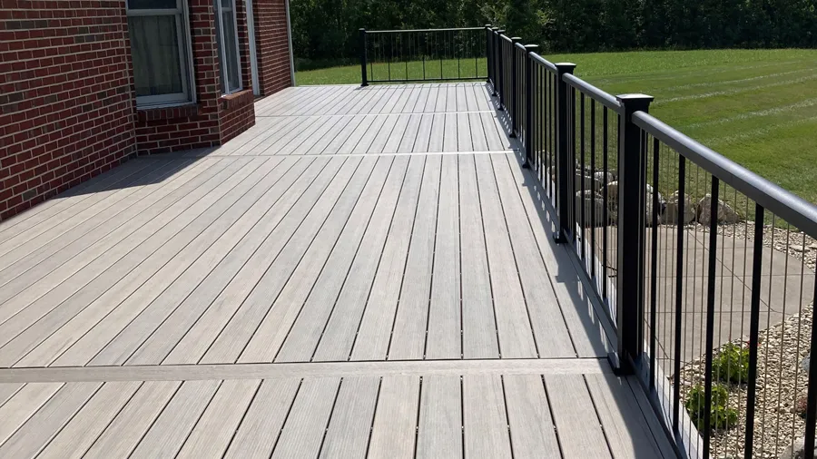 TimberTech Composite Legacy deck boards on a brand-new deck in the sun